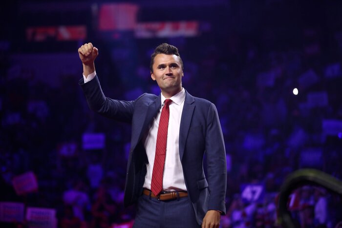 Charlie Kirk walking on stage