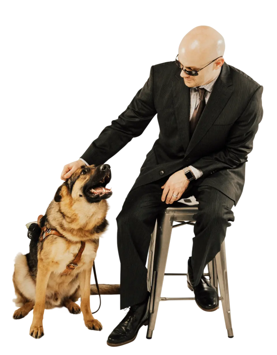 Chad E. Foster with his guide dog Sarge