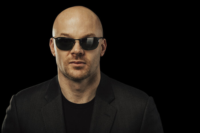 Chad E Foster business portrait in suit, motivational speaker headshot