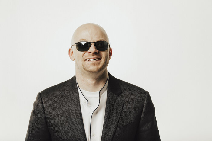 Professional business photo of Chad E Foster in formal suit