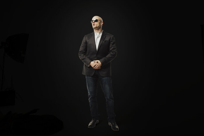 Chad E Foster corporate headshot in business suit