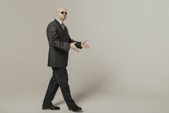 Chad E Foster corporate headshot in professional business suit