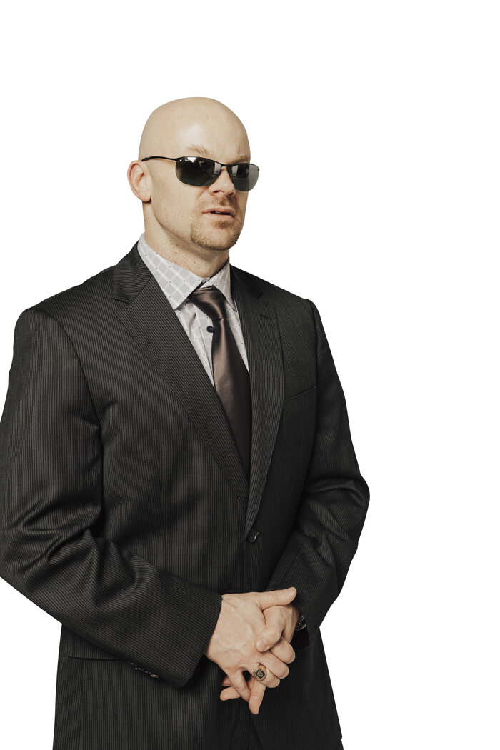 Professional vertical portrait of Chad E Foster in formal attire