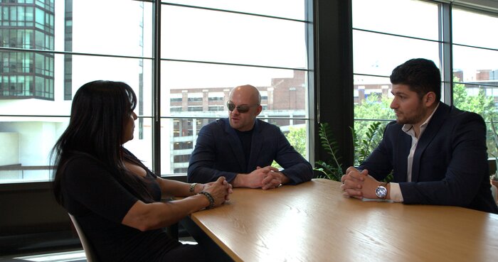 Chad E Foster in corporate meeting discussing business strategy and leadership