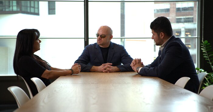 Business meeting with Chad E Foster leading strategic discussion