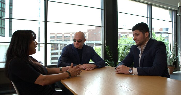 Chad E Foster facilitating business meeting with professional medium composition