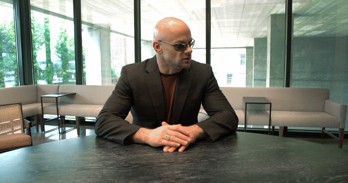 Business meeting featuring Chad E Foster in leadership consulting role