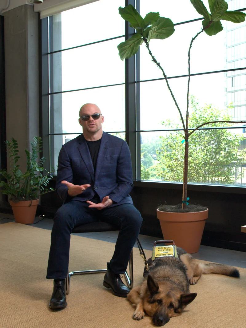 Chad E. Foster with his dog