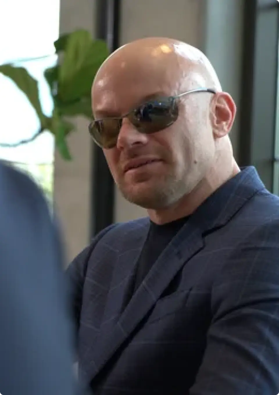 Chad E. Foster in a meeting