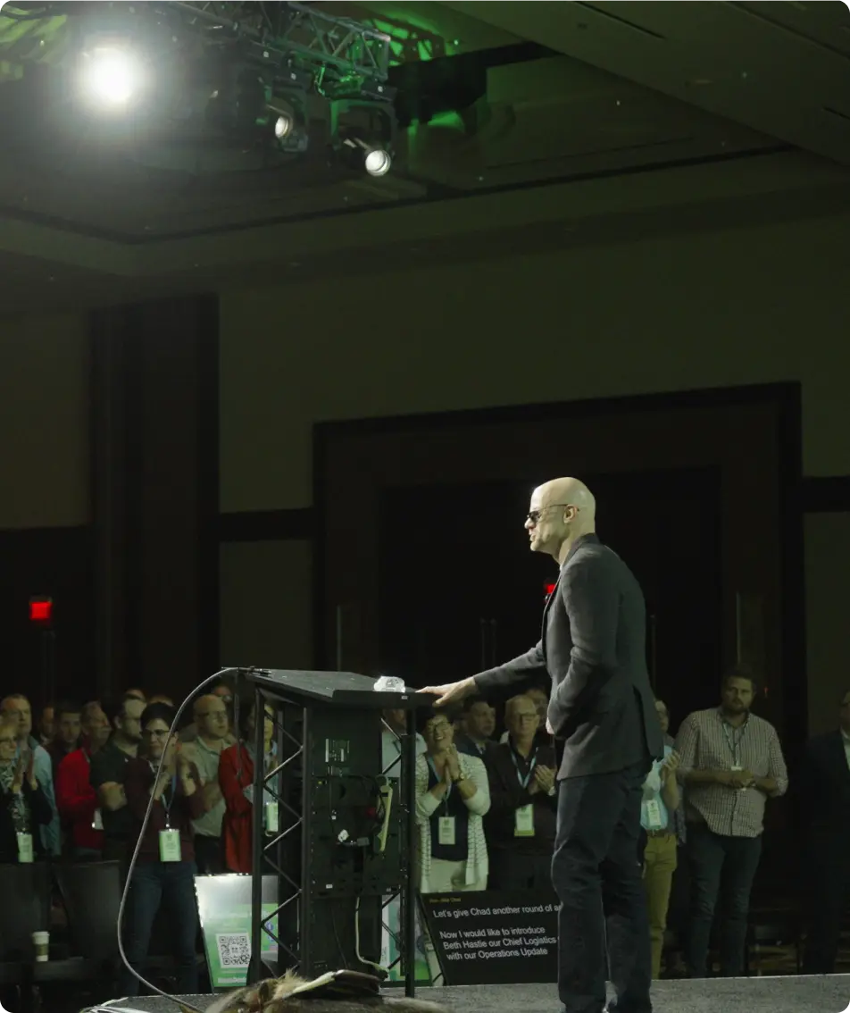 Chad E. Foster speaking at a corporate event