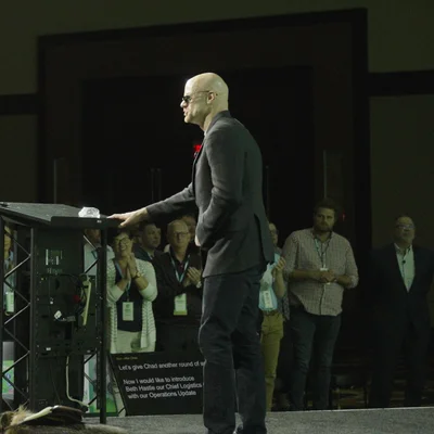 Chad E. Foster speaking on stage